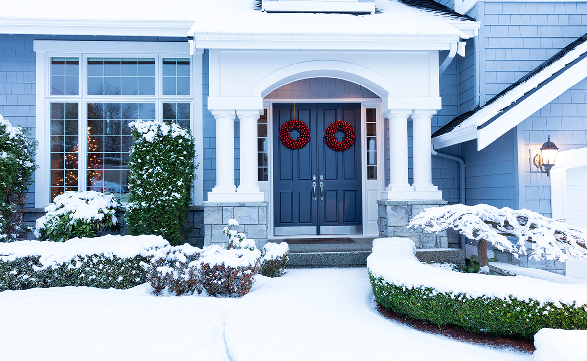 Snowy exterior of a home for sale in January